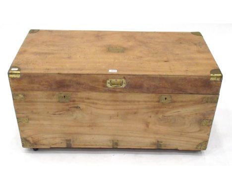 A 19th Century Camphorwood and Brass Bound Trunk, with hinged lid and brass recessed handle, on castors, 103cm by 53cm by 54c