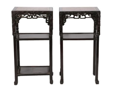 An Early 20th Century Chinese Padouk Wood and Pink Marble Two-Tier Plant Stand, of rectangular form, the carved apron above a