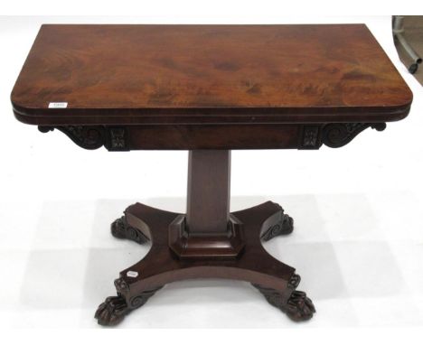 A William IV Carved Mahogany Foldover Card Table, 2nd quarter 19th century, the plain frieze flanked by carved flowerheads an
