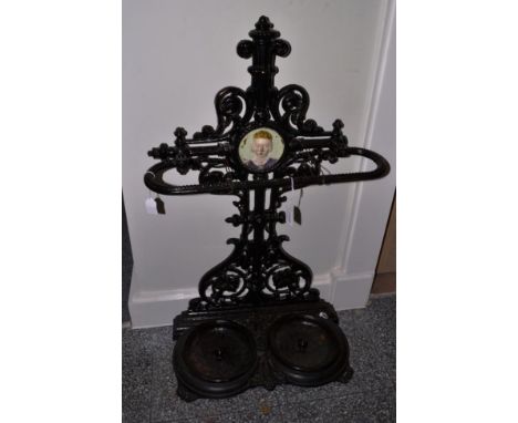 A Victorian Cast Iron and Black Painted Stick Stand, with 19th century lozenge registration mark, the foliate scrolled back s