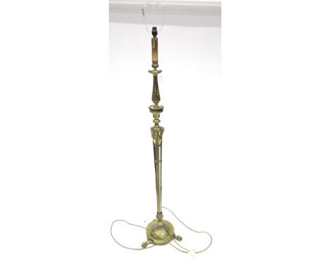 An Adam Revival Brass Standard Lamp, the upper section as an acanthus decorated candlestick supporting a wooden candle drip, 
