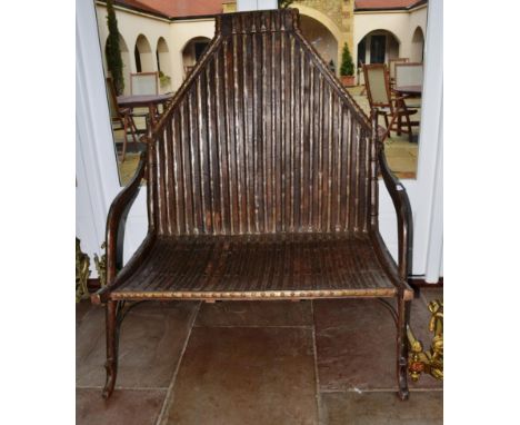 Rajasthan: A Hardwood and Metal Mounted Two-Seater Bench, with decorative strapwork throughout, the back support and seat wit