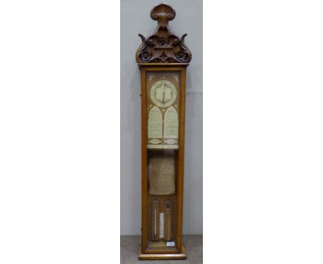 An Oak Cased Fitzroy Aneroid Barometer, circa 1880, carved floral and scroll pediment, aneroid movement, storm glass and ther