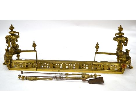 A Pair of French Gilt Metal Andirons, in Louis XIV style, with urn finials and leaf scrolls, on architectural bases, 46cm hig