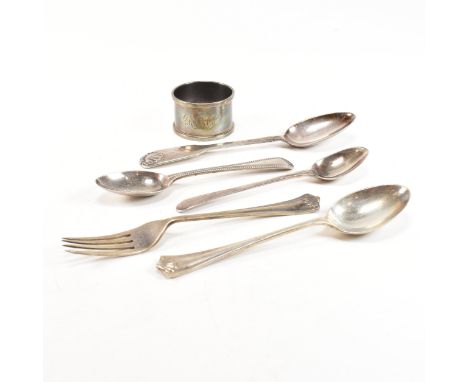 A collection of Victorian and later hallmarked silver flatware and napkin ring. The lot to include a Victorian tea spoon. Hal