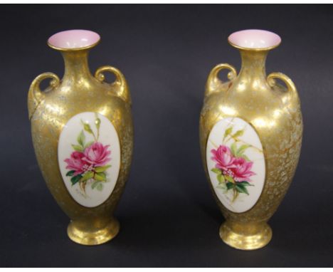 Frederick J Bray for Royal Worcester, a pair of painted and gilt bud vases (one at fault), each measuring approximately 65mm 