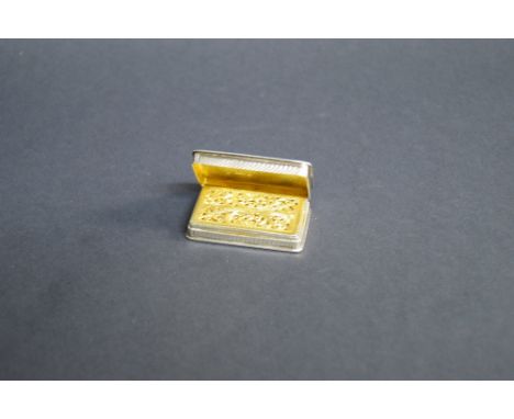 Nathaniel Mills, a hallmarked silver snuff box, with pierced grill and gilt-washed interior (26g)