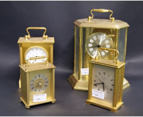 Three carriage clocks and one glass-cased clock