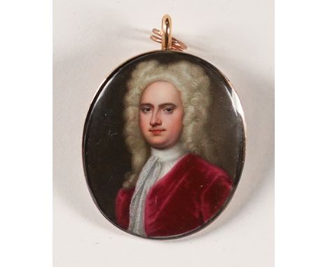CHRISTIAN FRIEDRICH ZINCKE (GERMAN, 1683-1767)Portrait miniature of Favel Peak, wearing a wig and a crimson coat
on enamel
4.