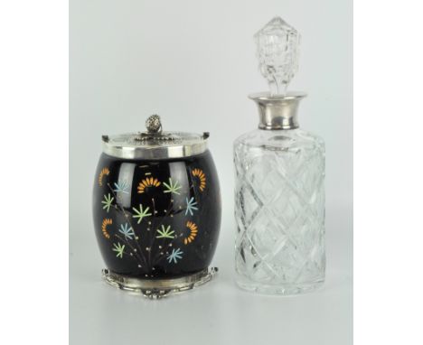 A early 20th century silver collared glass decanter, with moulded decoration and stopper, height 28cm; together with a cerami