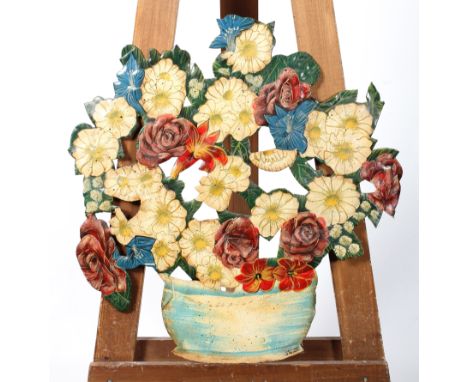 A Victorian style painted metal flower fire screen, 20th century, signed Mini, '86 Owl, cast as a pierced blue vase of flower