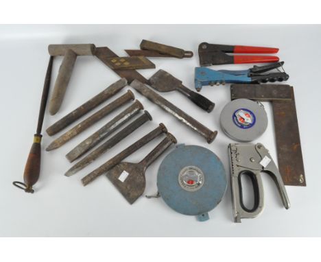 A selection of vintage tools, including chisels, Titan tacker and measuring blocks 