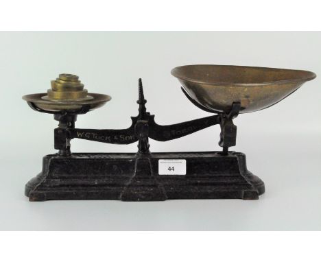 A set of Torquay W.G. Tuck and Son metal scales, with brass dish and weights