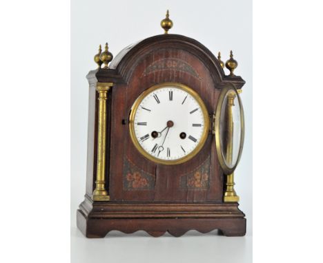 A 20th Century mantel clock, possibly by H. Carter Bowles, white enamel dial with Roman numerals, within a mahogany case on a