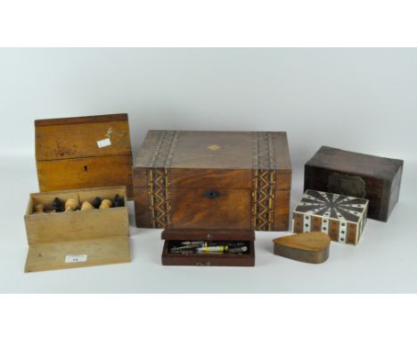 A collection of 20th century boxes, including a veneered example with straw work decoration, another with bone and metal deta