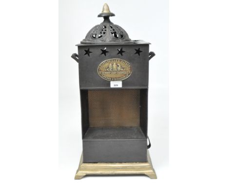 An early 20th century Rippingille's Patent ABC stove, by Albion Lamp Company, black painted sheet metal and cast iron, height