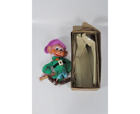 A large vintage Pelham puppet "Dopey" with original clothes 