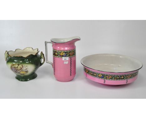 A vintage pink ceramic wash jug and basin with a frieze of birds and flowers, height of jug 29cm; together with a jardiniere 