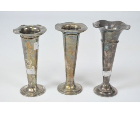 Three Mappin &amp; Webb silver plated trumpet vases, heights 19cm, 19.5cm and 20.5cm