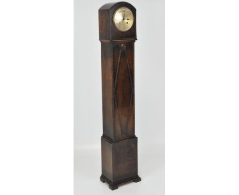 A mid-century grandmother clock in an oak case, Arabic numerals to the yellow metal face, the front with carved beading and f