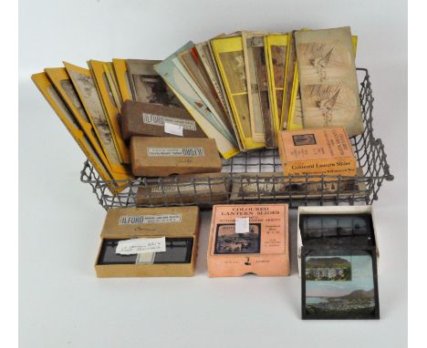 A collection of boxed sets of magic lantern slides stereo view photographs and Stereoscopic glass negatives, including some c