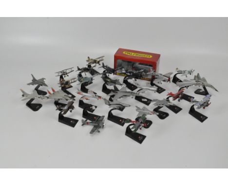 A large collection of kit built model aircraft, assorted historical examples, some mounted on stands