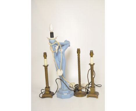 A light blue glazed stoneware lamp stand modelled as a woman, height 51cm; together with three metal Laura Ashley candlestick