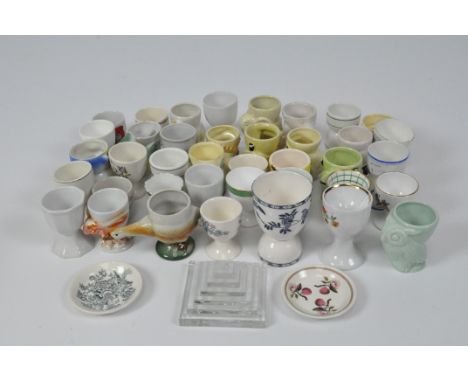A selection of vintage ceramic egg cups, various shapes and designs
