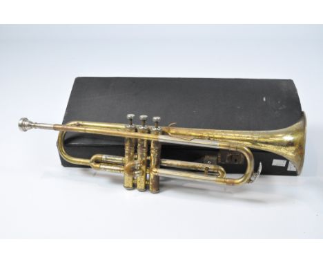 A 20th century trumpet, market 'Comet', within a fitted carry case