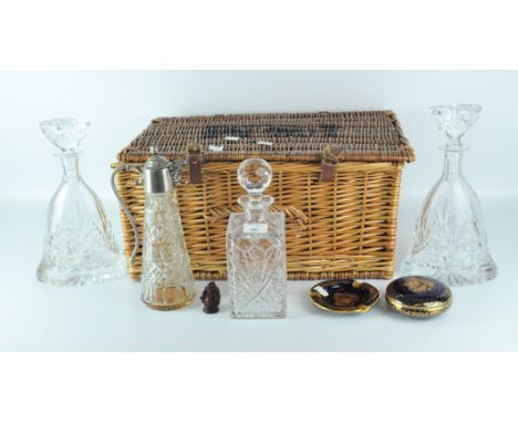 Three contemporary glass decanters, together with a metal topped glass jug, a ceramic Limoges pot and ash tray and a wicker b