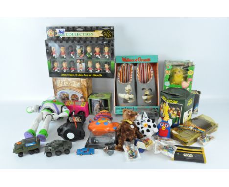 A selection of contemporary collectables, including a Buzz Lightyear model, Beryl Cook jigsaw puzzle and Star Wars wallet 