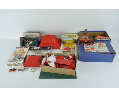 A large collection of vintage Bayko blocks and tiles, together with a small number of tinplate vehicles, a Kobe Yoko Ltd tinp