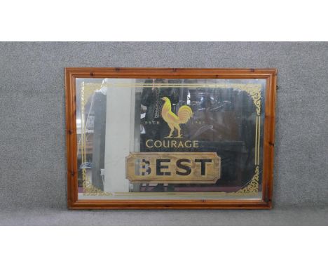 A large pine framed vintage Courage Best Bitter advertising mirror. Gilded lettering and rooster logo. H.89 W.129CM 