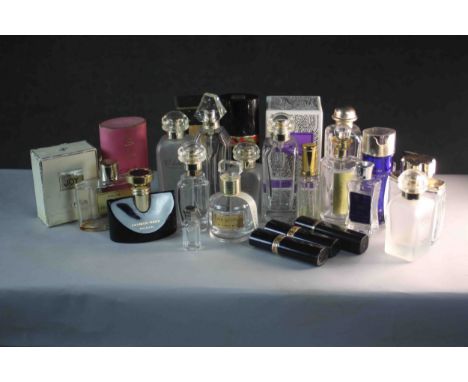 A collection of vintage empty cosmetic and perfume bottles. Some with boxes. 
