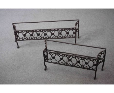 A pair of vintage cast iron pierced design plant pot stands. H.24 W.78 W.19 cm (largest) 