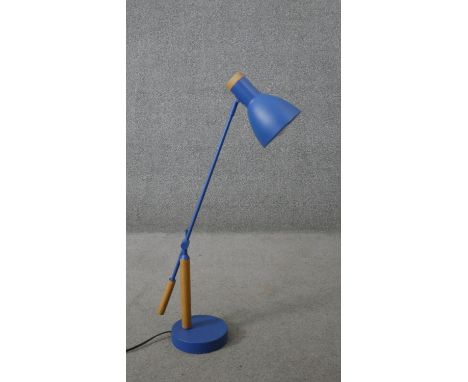 A Made.com blue anglepoise style desk lamp with beech detailing. H.66 W.67CM (extended) 