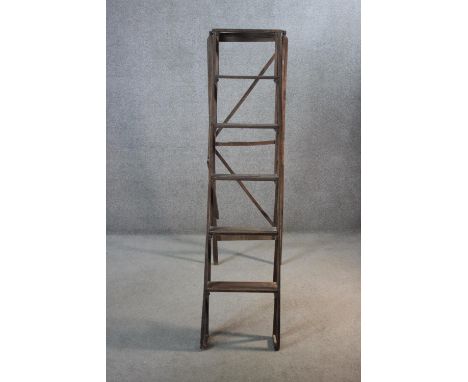 A set of vintage folding library step ladders. H.165 cm. 