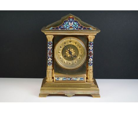 Brass and Cloisonné enamel mantel clock with a French movement, Arabic numerals on a brass dial, a bevelled glass front door 