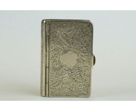 Silver snuff box modelled as a book "The Old Volume", engraved floral foliate scroll decoration to the cover with vacant cart
