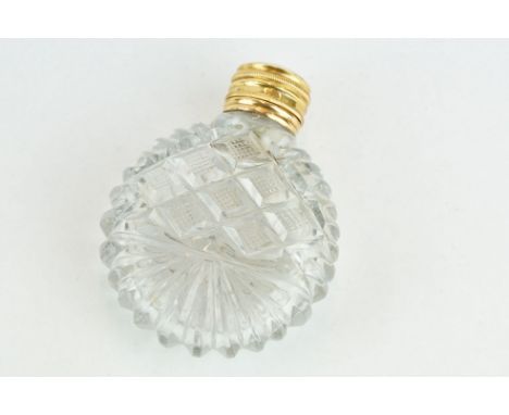19th century gold mounted cut glass scent bottle, circular body, original stopper, gold mount and hinged cap, height approx 8