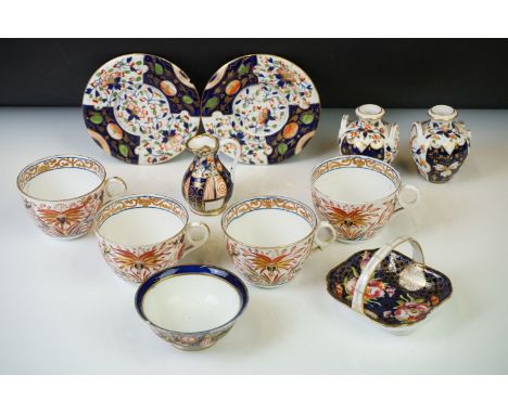 Group of Early 19th Century Crown Derby Imari pattern ceramics, to include two saucers, a pair of miniature twin-handled vase