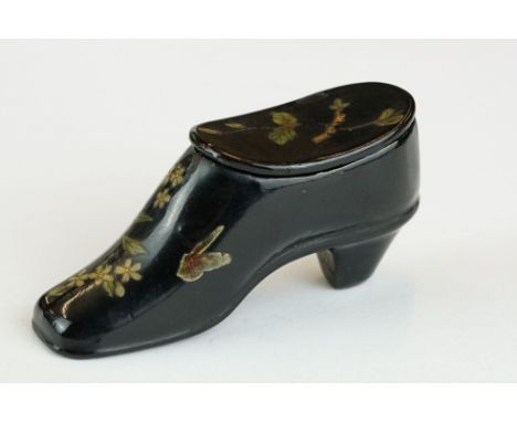 19th century snuff box modelled as a ladies shoe, lacquered with floral decoration, hinged lid, length approx 8cmProvenance: 