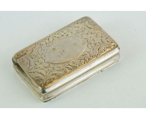 George III silver snuff box, the hinged lid with vacant oval cartouche, engraved floral and foliate decoration to the lid and