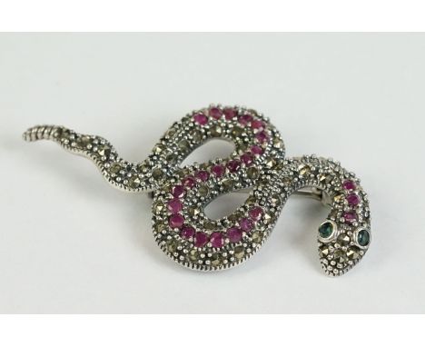 A silver, marcasite and ruby set snake brooch 