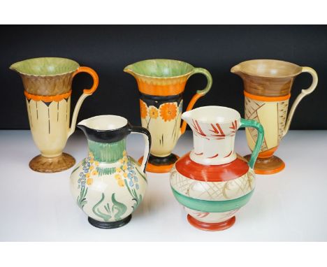 Five Myott, Son &amp; Co hand painted Art Deco jugs, decorated with floral, foliate and geometric designs on cream ground, al