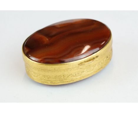 Banded agate gilt snuff box, polished agate slice to lid and base, cast floral decoration in low relief, length approx 5.5cmP