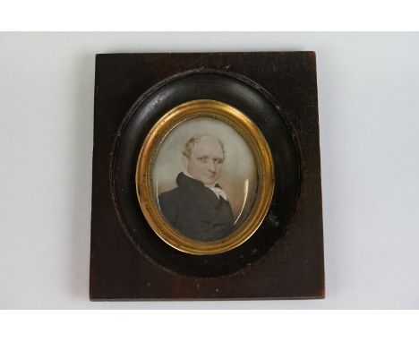 19th century English School with American provenance, portrait miniature of a gentleman wearing a black coat, possibly Mr Ste
