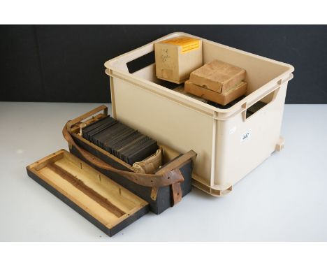 Collection of magic lantern glass slides contained within various boxes, to include a quantity of Tibetan related slides and 