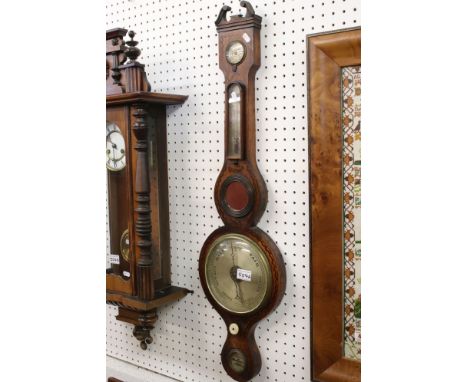 Early 20th Century J. Gadola, Taunton mahogany wheel barometer with swan neck top, thermometer, butlers mirror, silvered dial