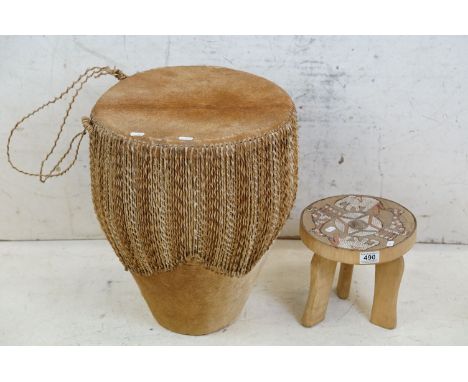 African cowhide bongo drum with twine fastenings, 47cm high, together with a small African beadwork three-legged wooden stool